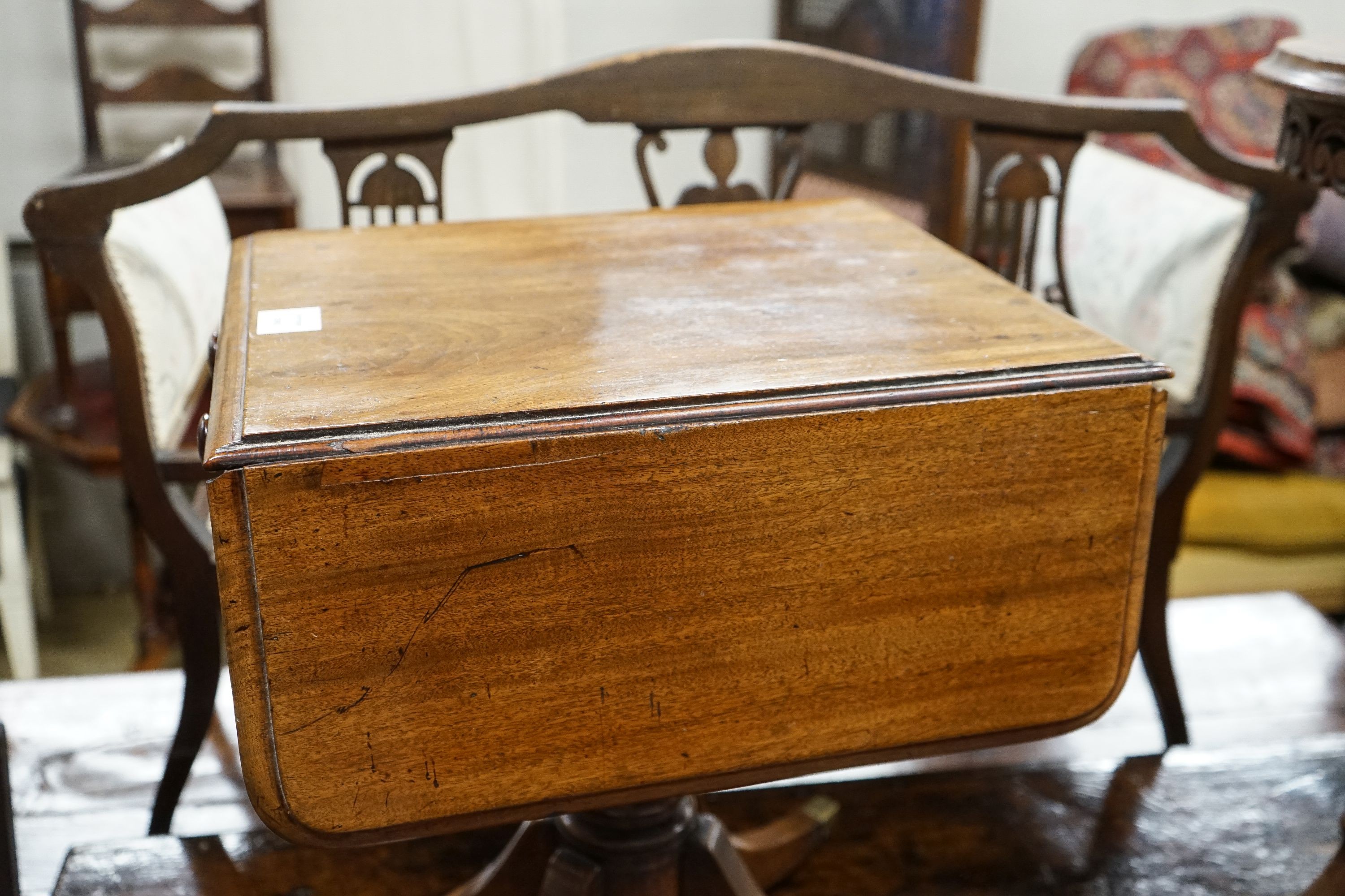 A Regency mahogany drop flap work table, (altered), width 39cm, depth 45cm, height 56cm